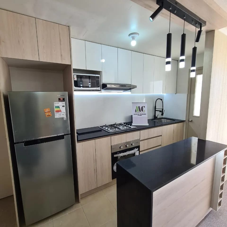 Cocina muebles caribe isla negra encimera negra